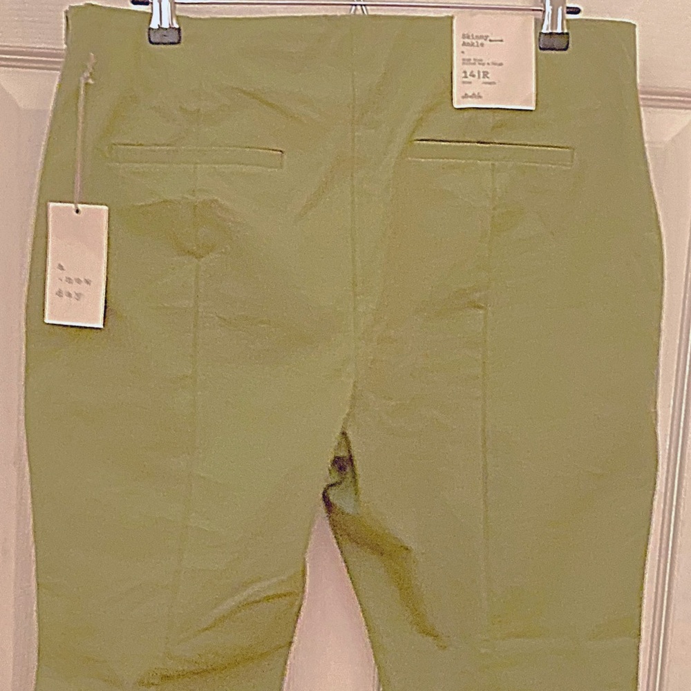 Brand new stretch side zip pants